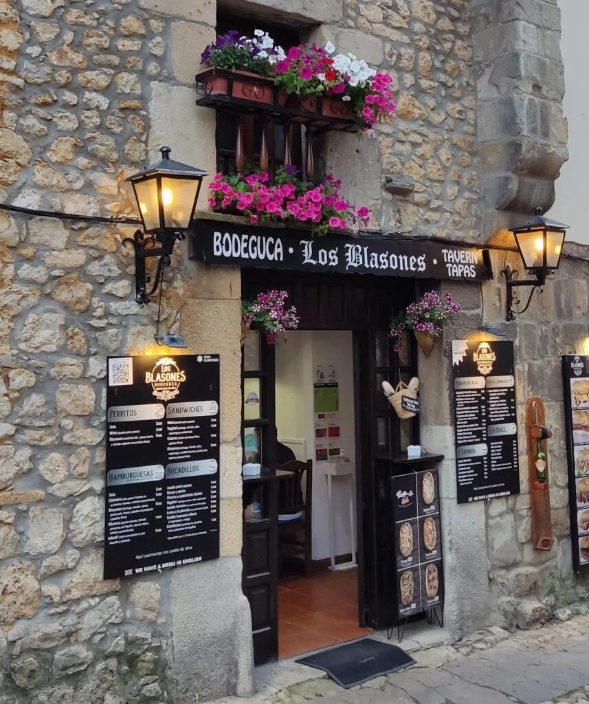Exterior façade of the Los Blasones restaurant in Santillana del Mar, daylight