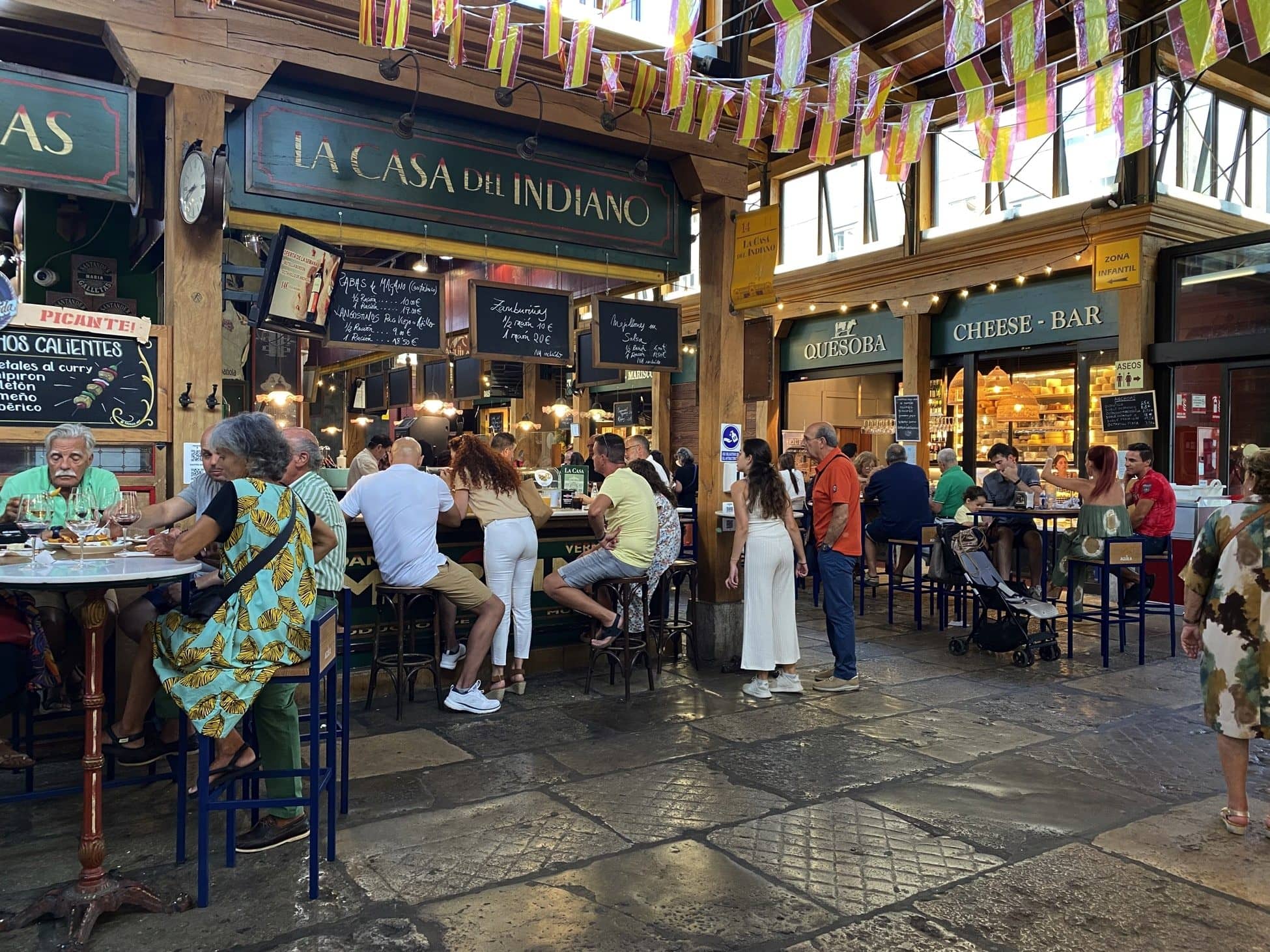 Interior of the Mercado del Este in Santander with food stalls and a lively atmosphere