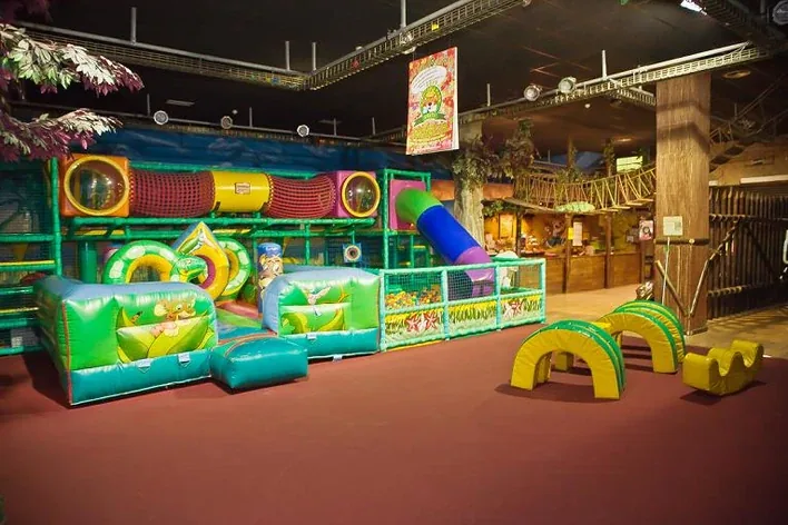 Café area for parents next to the party space at Aventura Park, in Santander, during a birthday snack