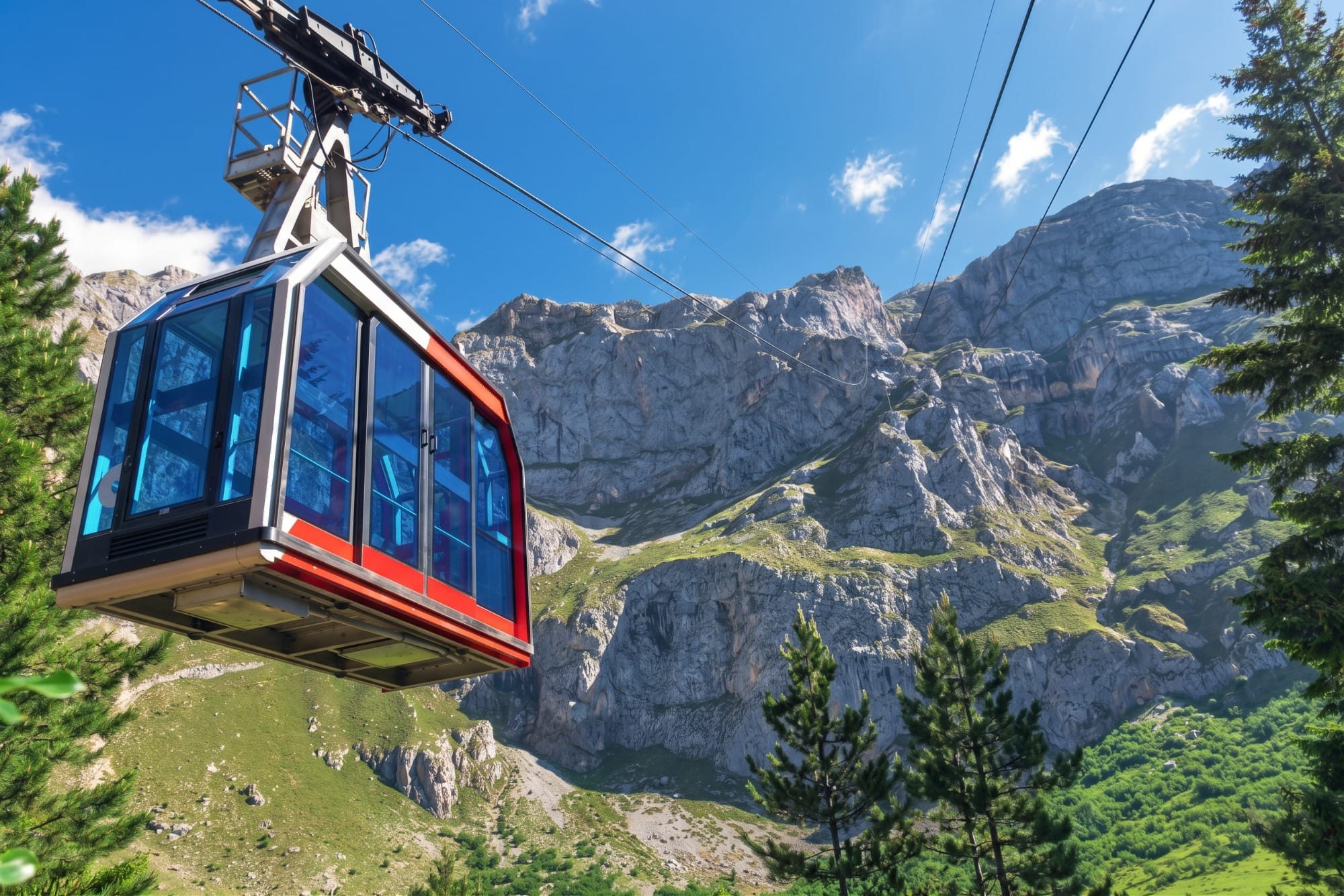 Fuente Dé cable car cabin climbing the rock face towards the Mirador del Cable