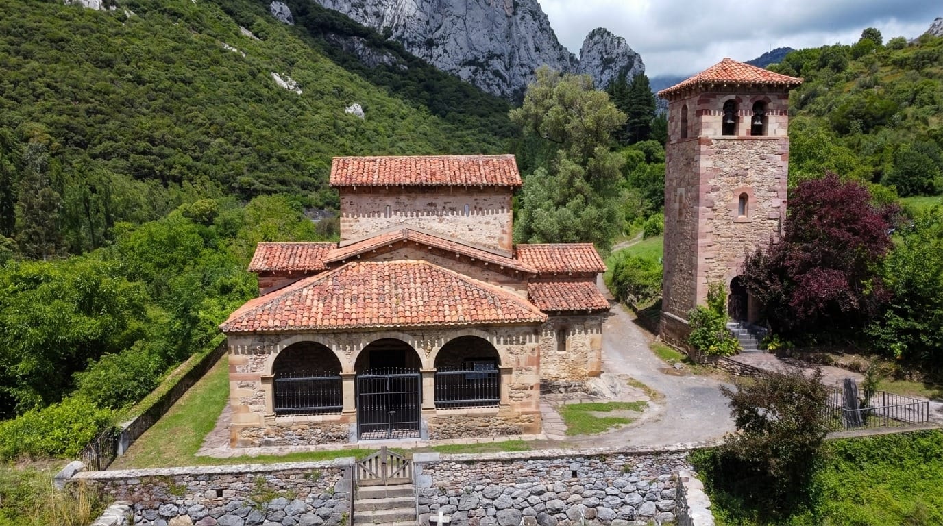 Façade and portico of the Mozarabic church of Santa María de Lebeña, with the mountain behind
