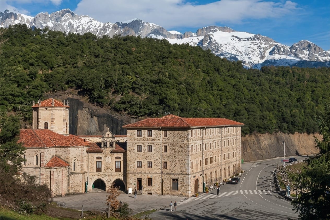 Monastery of Santo Toribio de Liébana seen from outside, on its hillside above the valley