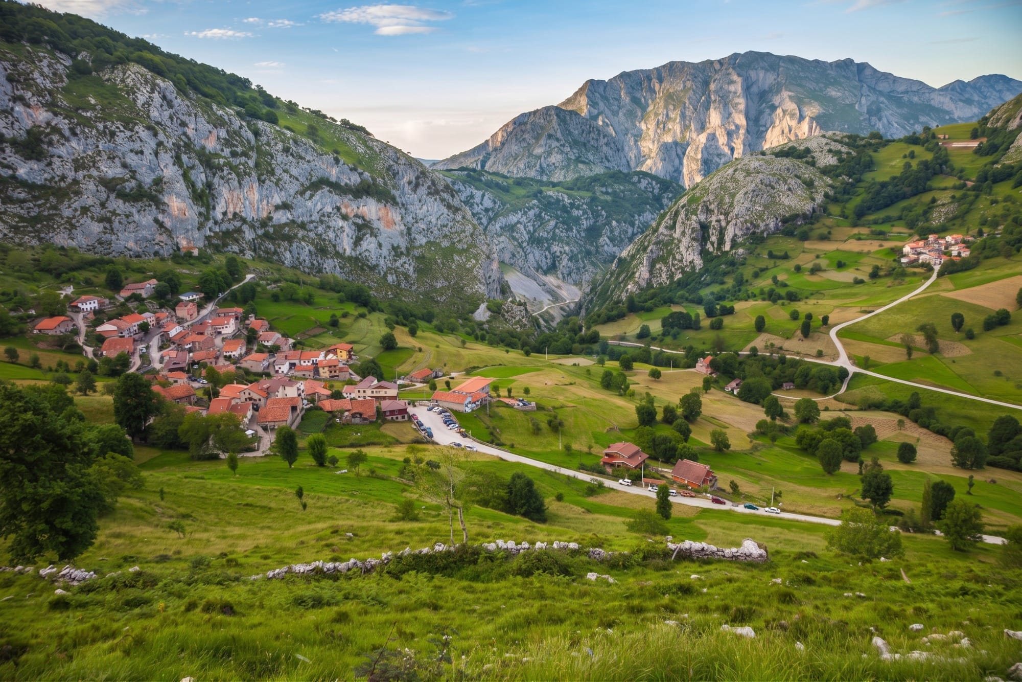 General view of Potes with the Picos de Europa in the background, as a context image of the Liébana valley